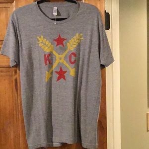 K C Tee